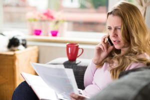 Credit Repair Lawyers unfair credit reporting Lady on phone