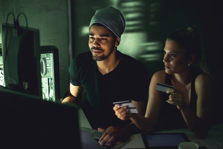 Credit Repair Lawyers of America Identity Theft Hackers in shady warehouse